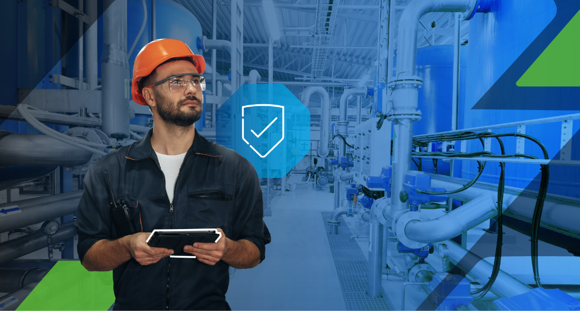 Man with a hard hat holding a tablet